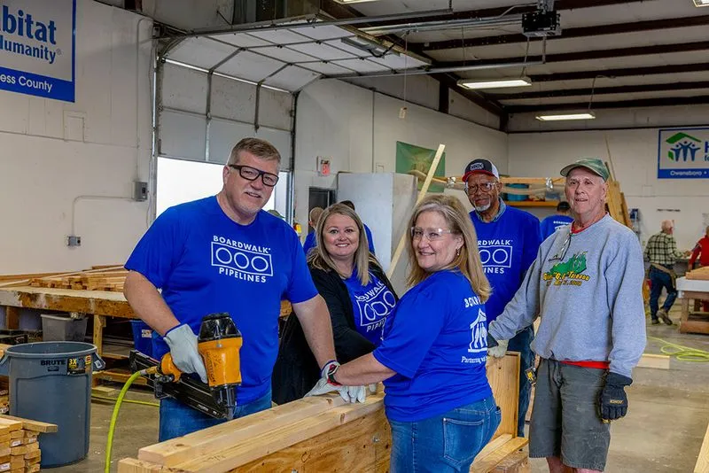 Boardwalk volunteers building together at a community workshop